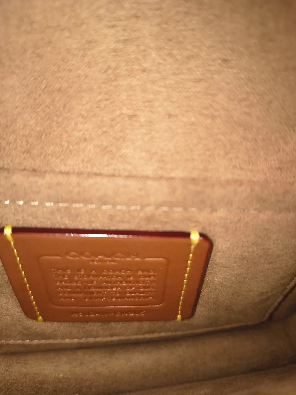 Coach excellent never